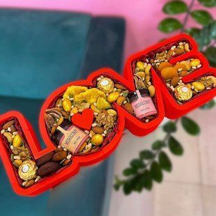 Box with dried fruits and honey
